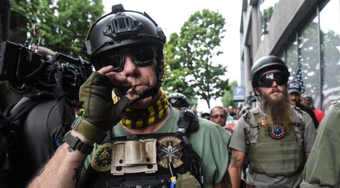 Facebook banned violent militia groups. We still found plenty of them on its platform.