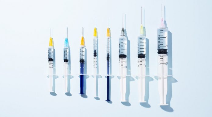 Treatment and Vaccine Trials are Halted, US Cases Rise, and More Coronavirus News