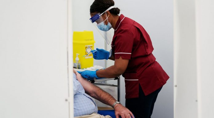 The First Shots, Grim Milestones, and More Coronavirus News