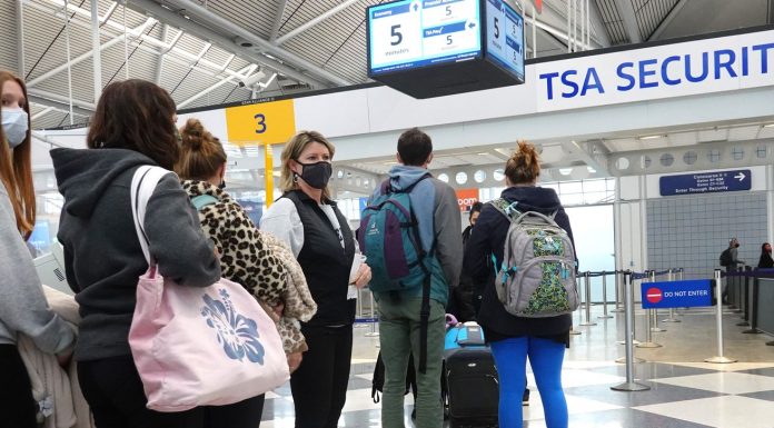 The number of Americans getting back on planes is taking off